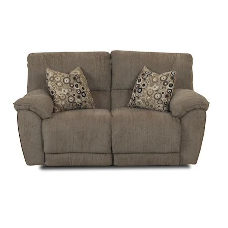Contemporary Styled Reclining Loveseat with Pillows